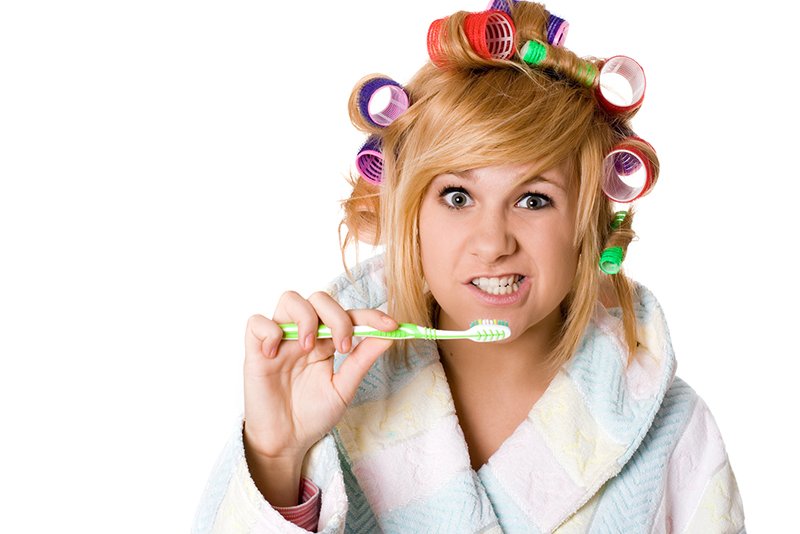 woman bad at brushing teeth